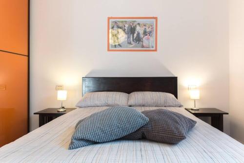 A bed or beds in a room at Comforty - Stay in Verona