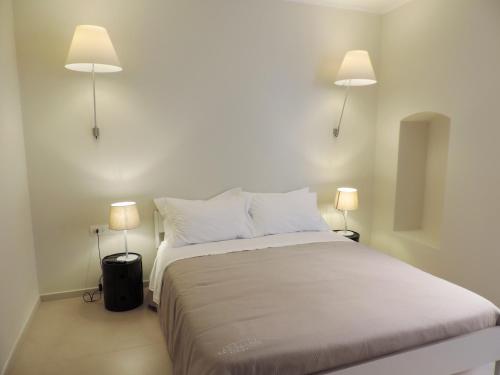 Katil atau katil-katil dalam bilik di Le Casasse
