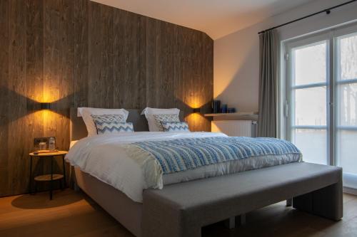 Cama o camas de una habitación en De Kaleihoeve