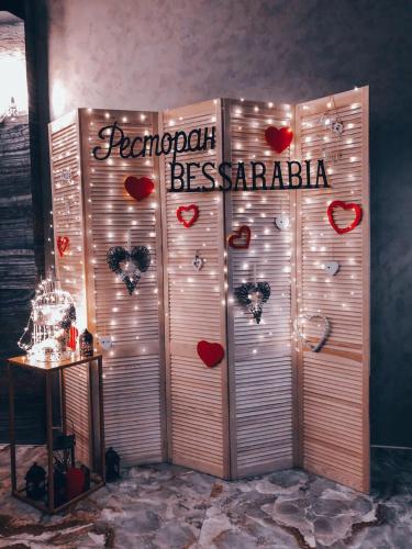 a metal garage door with hearts on it at Отель БЕССАРАБИЯ in Izmail