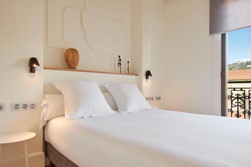 Postel nebo postele na pokoji v ubytování Allegra by FeelFree Rentals