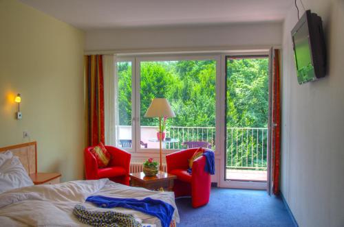 Postel nebo postele na pokoji v ubytování Hotel Excelsior