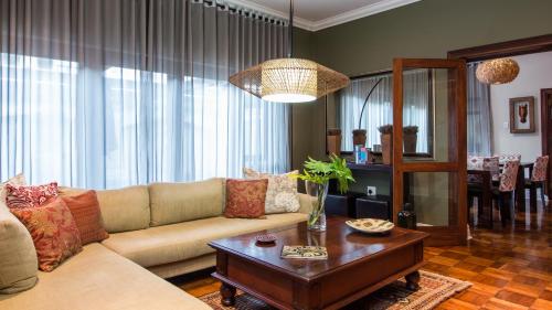 a living room with a couch and a table at Manor 38 in Port Elizabeth
