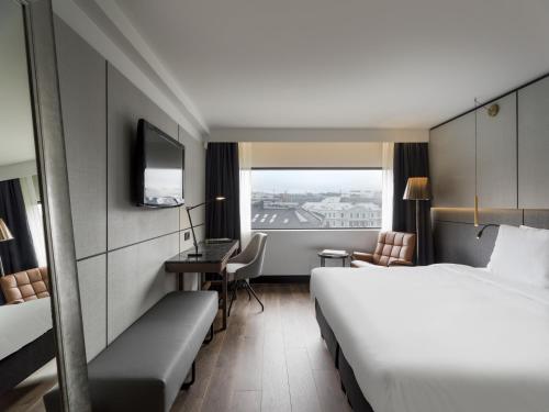 Letto o letti in una camera di Radisson Blu Scandinavia Hotel, Oslo