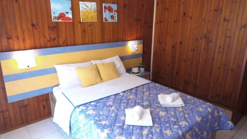 Postel nebo postele na pokoji v ubytování VVF La Salvetat