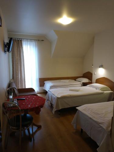 Postel nebo postele na pokoji v ubytování Hotel Górsko