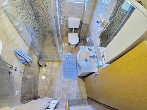 Vonios kambarys apgyvendinimo įstaigoje Apartments Pravica