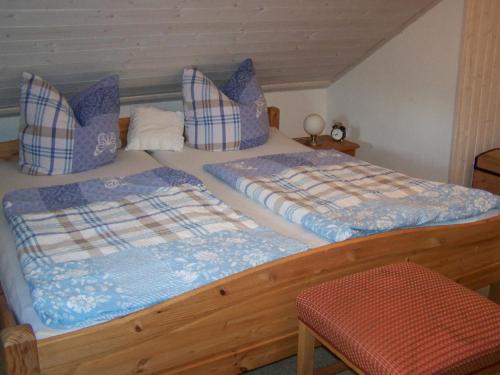 En eller flere senger på et rom på Pension Frauenschuh