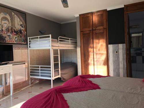 Poschodová posteľ alebo postele v izbe v ubytovaní B&B Finca La Luna Azul