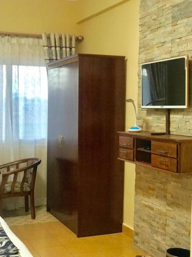Η κουζίνα ή μικρή κουζίνα στο Hôtel Sky blue Mada