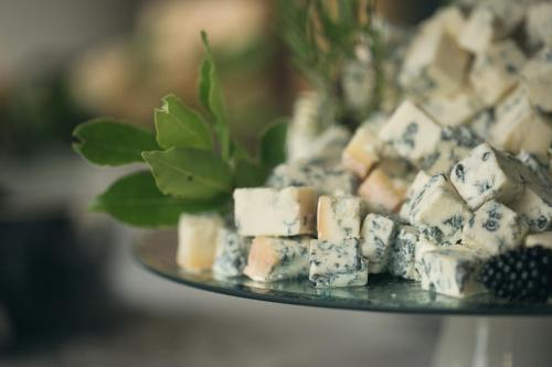 a plate of food with blue cheese on it at Agriturismo La Galizia in Cuggiono
