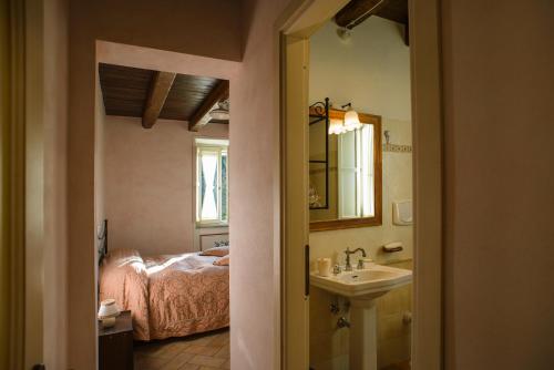 Postel nebo postele na pokoji v ubytování Agriturismo Colle Tocci
