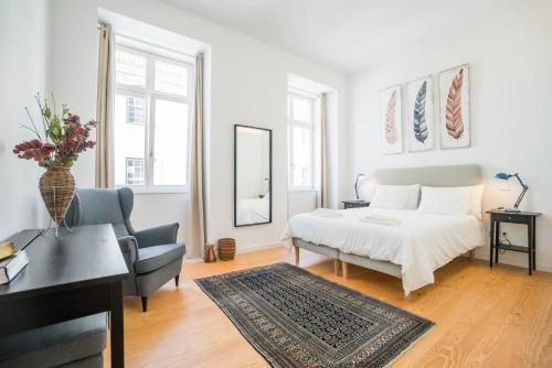 Voodi või voodid majutusasutuse Spacious & Bright Apartment in Cais Sodre toas