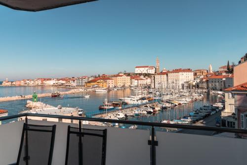 a view of a marina with boats in the water at Fredi in Piran