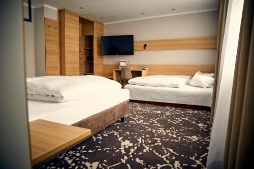 Säng eller sängar i ett rum på Bed&Breakfast Erber