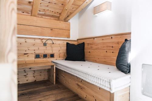 Voodi või voodid majutusasutuse Dolomites Living Hotel Tirler toas