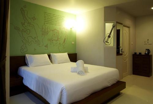 Postel nebo postele na pokoji v ubytování Loft 77