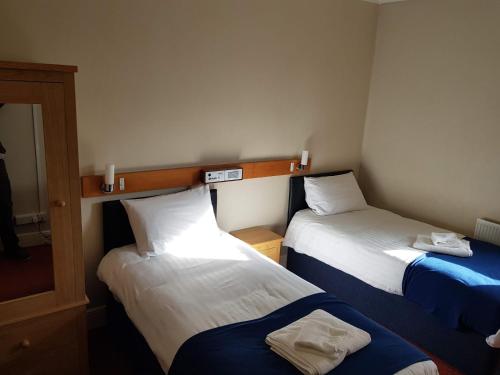 Newark Hotel Peterboroughにあるベッド