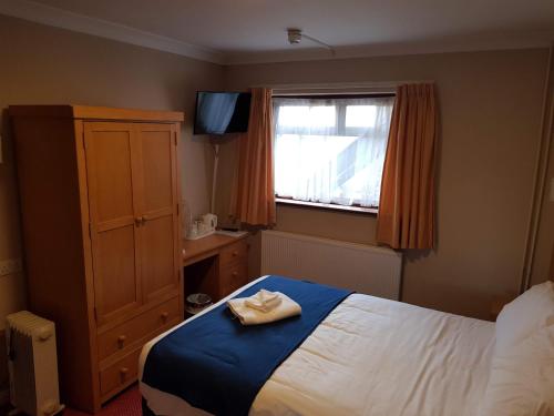 Newark Hotel Peterboroughにあるベッド