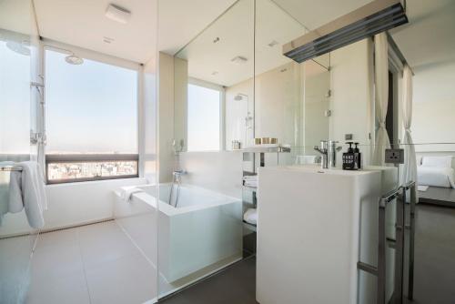 Ein Badezimmer in der Unterkunft Hotel Cappuccino
