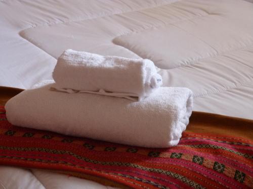Ліжко або ліжка в номері Piacere Hotel