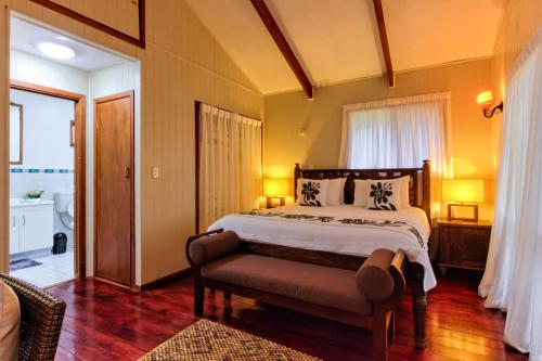 מיטה או מיטות בחדר ב-Te Ava Beach Villas