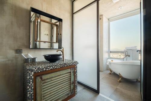 Ein Badezimmer in der Unterkunft Hotel Cappuccino