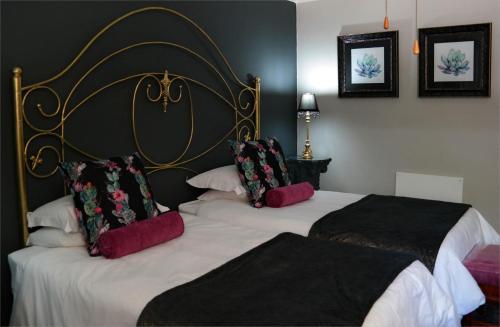Postel nebo postele na pokoji v ubytování Arcadia 4star Guesthouse Kroonstad