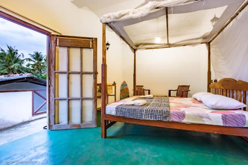 Dorian Guest House and Restaurantにあるベッド