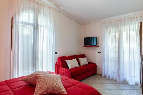 Μια τηλεόραση ή/και κέντρο ψυχαγωγίας στο Ohana Bed and Breakfast