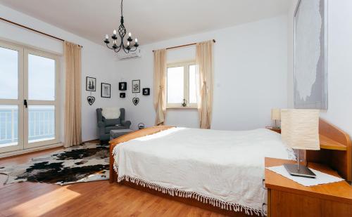 Posteľ alebo postele v izbe v ubytovaní Apartment THE VIEW