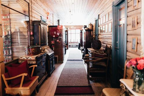 a hallway in a room with wooden walls at Tuddal Høyfjellshotel in Tuddal