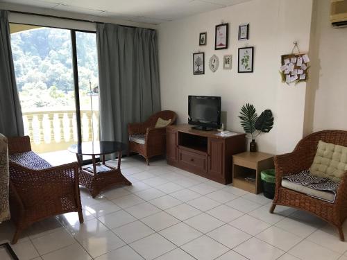 Гостиная зона в coralbay apartment pangkor island