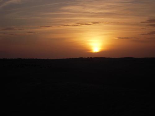 Amanecer o atardecer desde la casa de huéspedes o alrededores