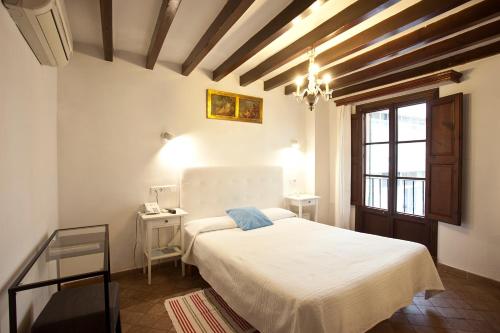 Llit o llits en una habitació de Turismo de Interior Ca Sa Padrina