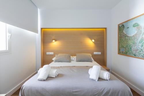 Säng eller sängar i ett rum på Urbantec Realty - Atocha y Museos
