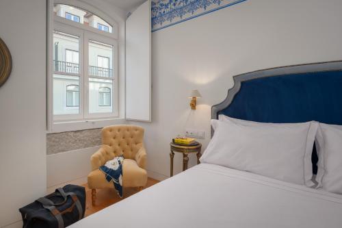 En eller flere senge i et værelse på Residentas Aurea