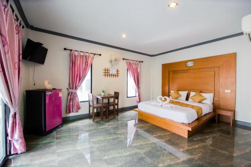 Postel nebo postele na pokoji v ubytování Numjaan Resort