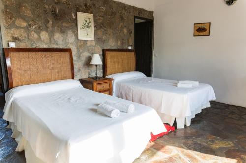 Postel nebo postele na pokoji v ubytování Casa La Viña
