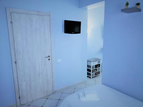 Albachiara Guest Houseにあるテレビまたはエンターテインメントセンター