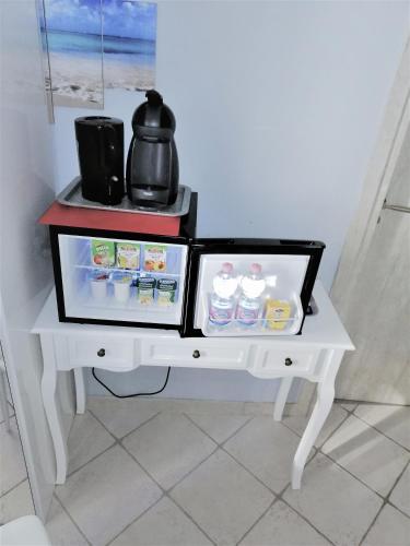 Albachiara Guest Houseにあるコーヒーまたはお茶