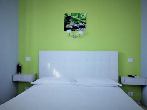 Albachiara Guest Houseにあるベッド