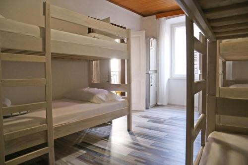 Postel nebo postele na pokoji v ubytování Hostel Korcula