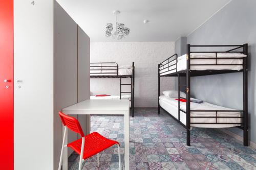 Ένα ή περισσότερα κρεβάτια σε δωμάτιο στο WOW Hostel