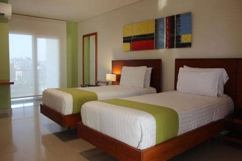 Katil atau katil-katil dalam bilik di Hotel Atrium Plaza