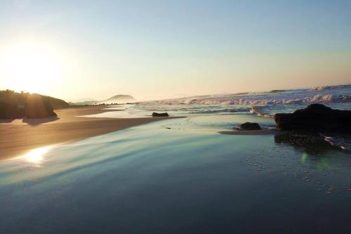 a view of a beach with the ocean at Las Villas, Villa Alegria,Troncones in Troncones