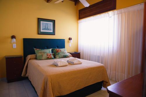 Кровать или кровати в номере Apart Sabina del Mar