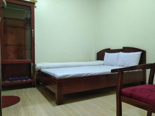
A bed or beds in a room at 51 GuestHouse - 1st Branch
