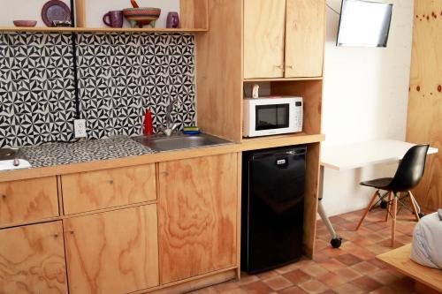 Η κουζίνα ή μικρή κουζίνα στο Coyoacan City Lofts