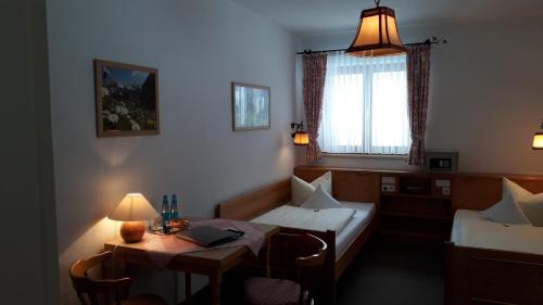 Postel nebo postele na pokoji v ubytování Haus Florian